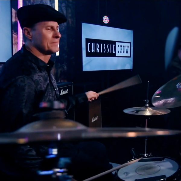 Portrait of Stephen J Krupa playing the drumms