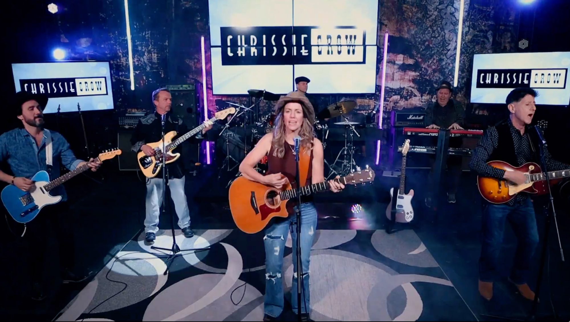 Chrissie Crow Band playing on stage